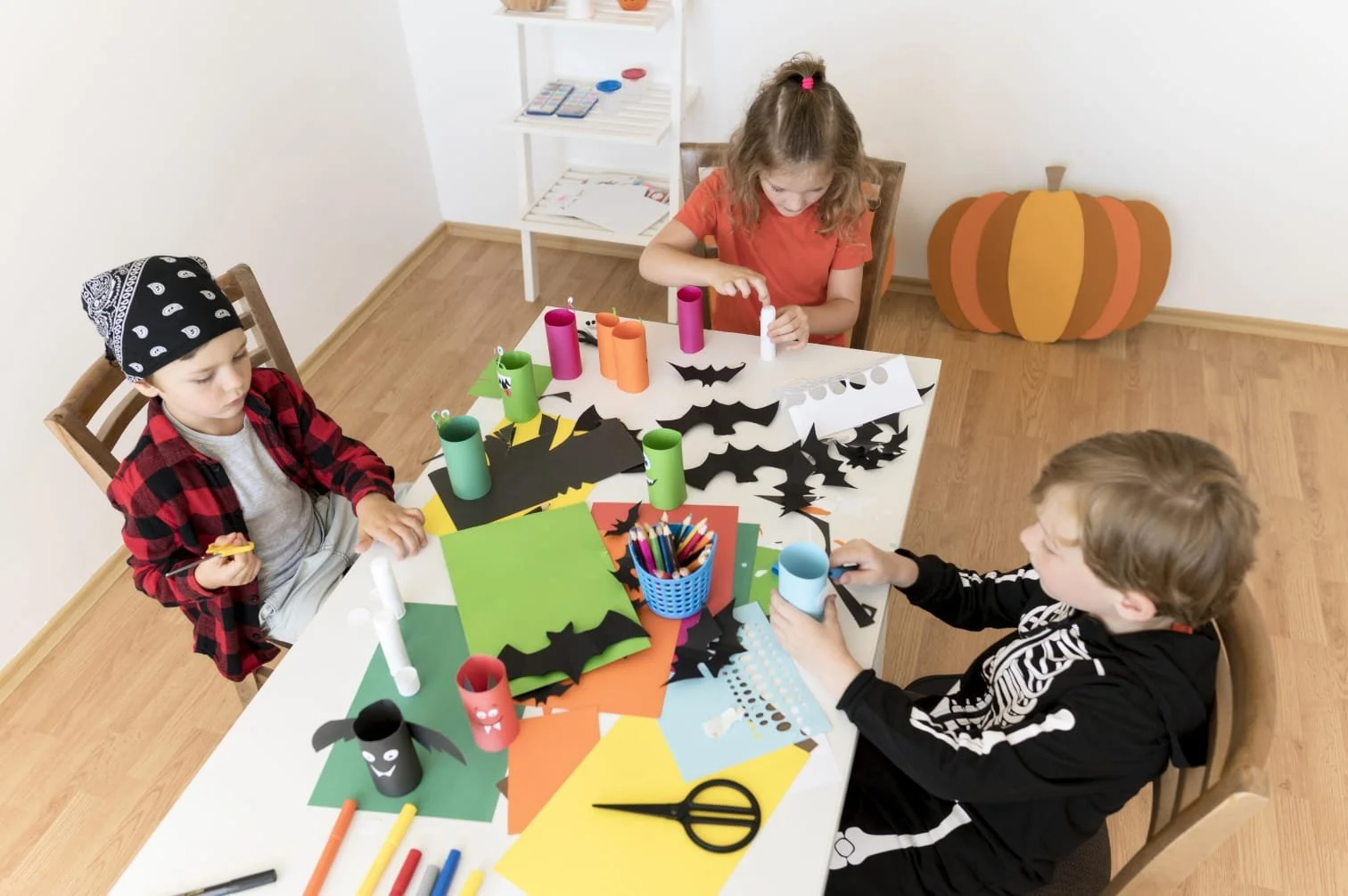 Children creating fun Halloween-themed arts and crafts projects at childdaycaretracy